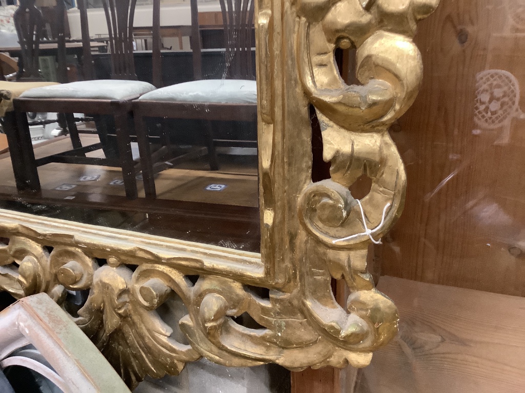 An 18th century style carved giltwood wall mirror, width 75cm height 110cm